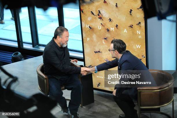 Artist Ai Weiwei and moderator Ricky Camilleri attend Build to discuss 'Human Flow' at Build Studio on October 6, 2017 in New York City.