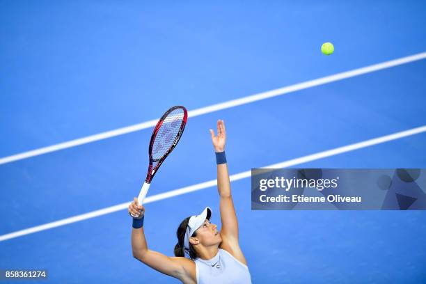 Caroline Garcia of France serves against Elina Svitolina of Ukraine during their Women's singles Quarterfinal match on day seven of 2017 China Open...