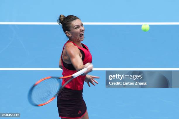 Simona Halep of Romania returns a shot during the Women's singles Quarterfinals match against Daria Kasatkina of Russia on day seven of 2017 China...