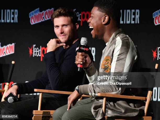 Scott Eastwood and John Boyega speak onstage during the Pacific Rim: Uprising panel at 2017 New York Comic Con on October 6, 2017 in New York City.