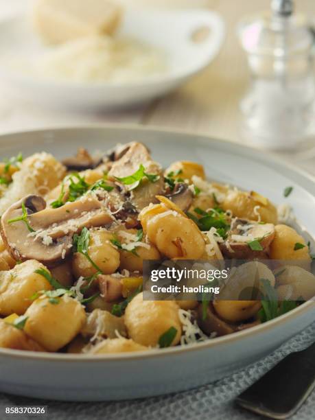 mushroom gnocchi - gnocchi stock pictures, royalty-free photos & images