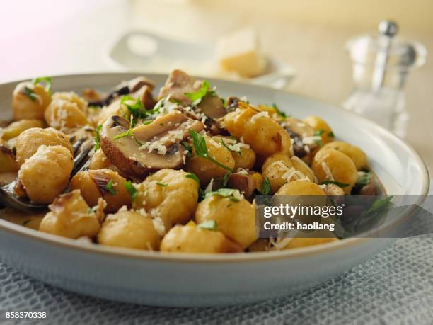 mushroom gnocchi - crimini mushroom stock pictures, royalty-free photos & images