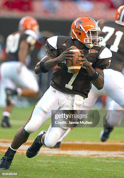 Bowling Green quarterback Freddie Barnes runs for several yards versus the Wisconsin Badgers at Cleveland Browns Stadium, Cleveland, Ohio, September...