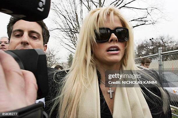 Photo dated 28 February, 2006 shows former Playboy playmate Anna Nicole Smith arriving at the US Supreme Court with her attorney Howard Stern in...