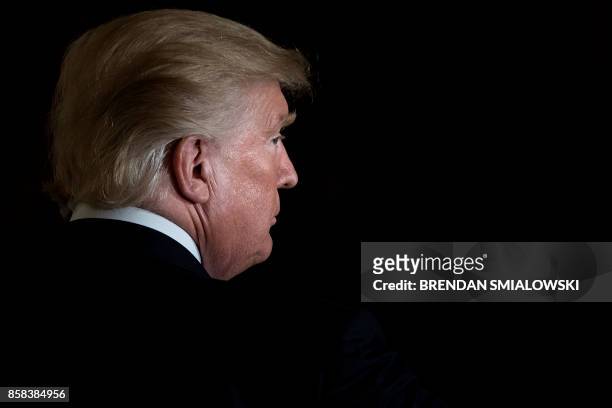President Donald Trump leaves after a Hispanic Heritage Month event in the East Room of the White House October 6, 2017 in Washington, DC. -...