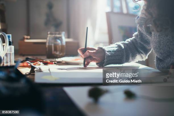 painting watercolour. - creative occupation stock-fotos und bilder