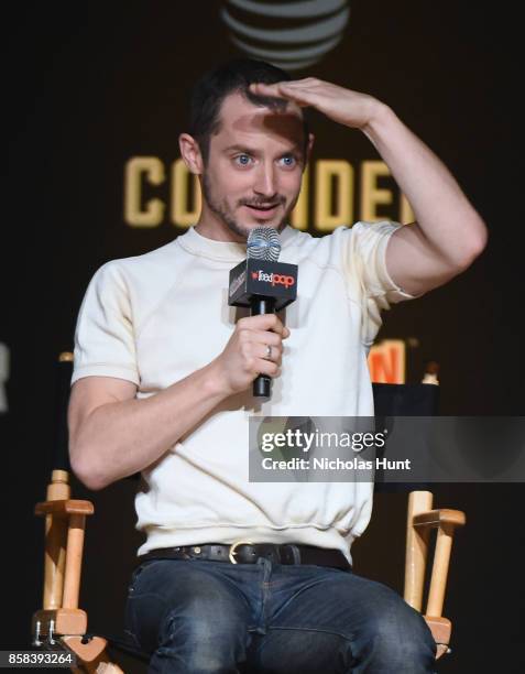 Elijah Wood speaks onstage during the Dirk Gently's Holistic Detective Agency - BBC AMERICA Official Panel during 2017 New York Comic Con on October...