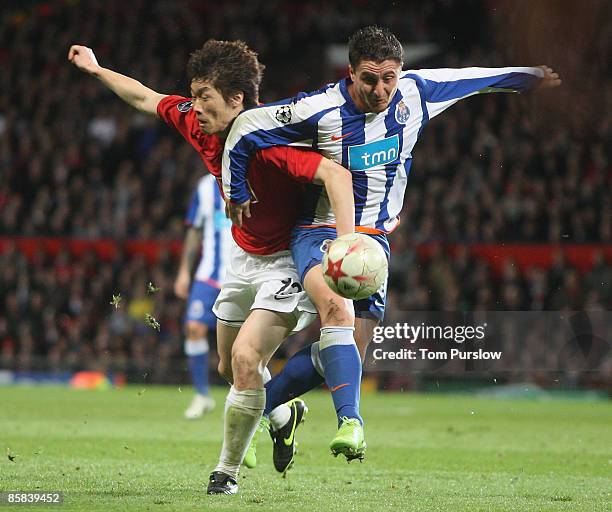 Ji-Sung Park of Manchester United clashes with Cristian Rodriguez of FC Porto during the UEFA Champions League Quarter-Final First Leg match between...