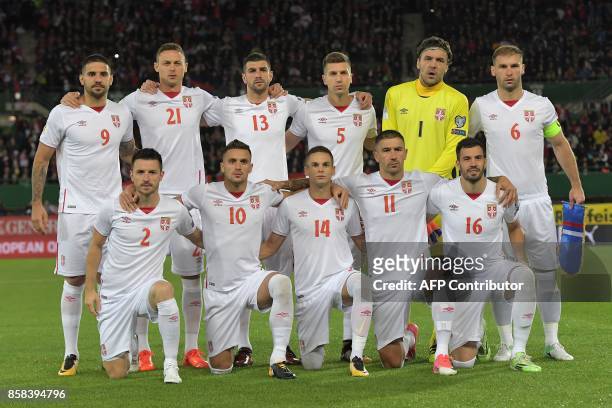 Serbia's players pose for a family picture before the FIFA World Cup 2018 qualification football match between Austria and Serbia at the Ernst Happel...