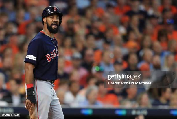 Chris Young of the Boston Red Sox reacts after scoring a run in the second inning against the Houston Astros during game two of the American League...