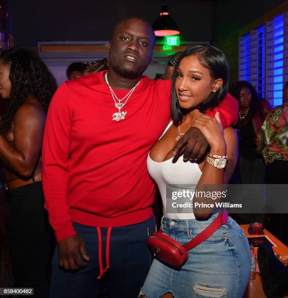 Zoey Dollaz and Bernice Burgos attend Baller Alert's Bowl With a Baller at Basement Bowl on October 5, 2017 in Miami, Florida.