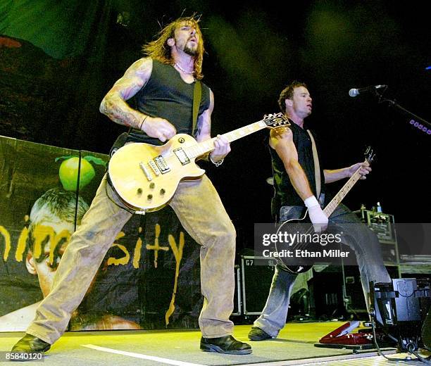 Sevendust guitarist John Connolly and bassist Vince Hornsby perform as the band opens for Creed at the Thomas & Mack Center October 4, 2002 in Las...