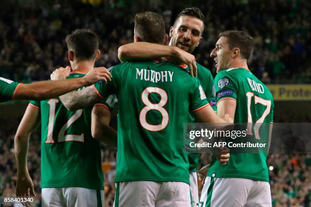 Republic of Ireland's striker Daryl Murphy celebrates scoring their second goal during the FIFA World Cup 2018 qualification football match between...