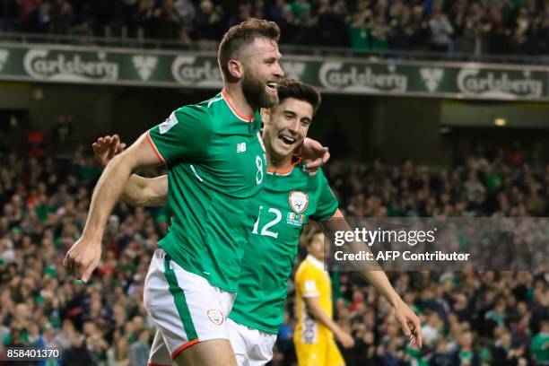 Republic of Ireland's striker Daryl Murphy celebrates scoring their second goal with Republic of Ireland's midfielder Callum O'Dowda during the FIFA...