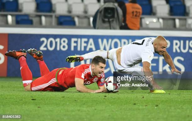 Sam Vokes of Wales in action against Jaba Kankava of Georgia during the FIFA 2018 World Cup Qualifier between Georgia and Wales at Boris Paichadze...