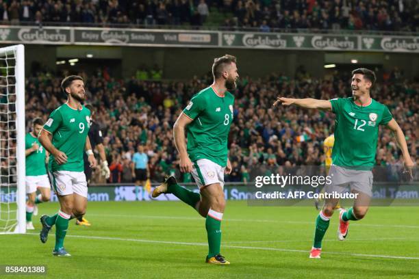 Republic of Ireland's striker Daryl Murphy celebrates scoring their second goal during the FIFA World Cup 2018 qualification football match between...