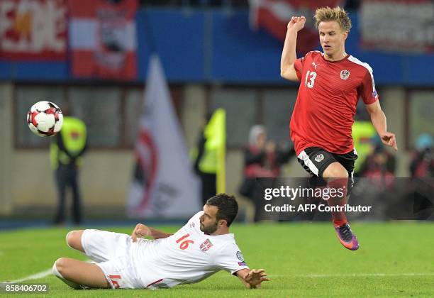 Austria's Moritz Bauer vies with Serbia's Luka Milivojevic during the FIFA World Cup 2018 qualification football match between Austria and Serbia at...