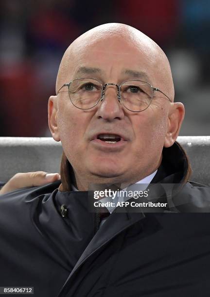 Serbia's head coach Slavoljub Muslin looks at his players during the FIFA World Cup 2018 qualification football match between Austria and Serbia at...