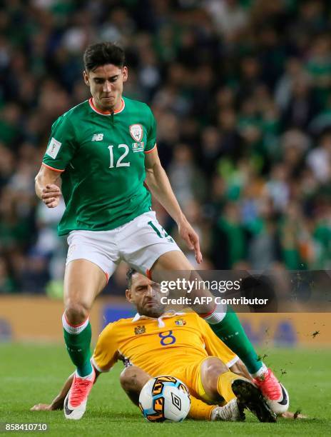 Moldovia's midfielder Alexandru Gatcan challenges Republic of Ireland's midfielder Callum O'Dowda during the FIFA World Cup 2018 qualification...