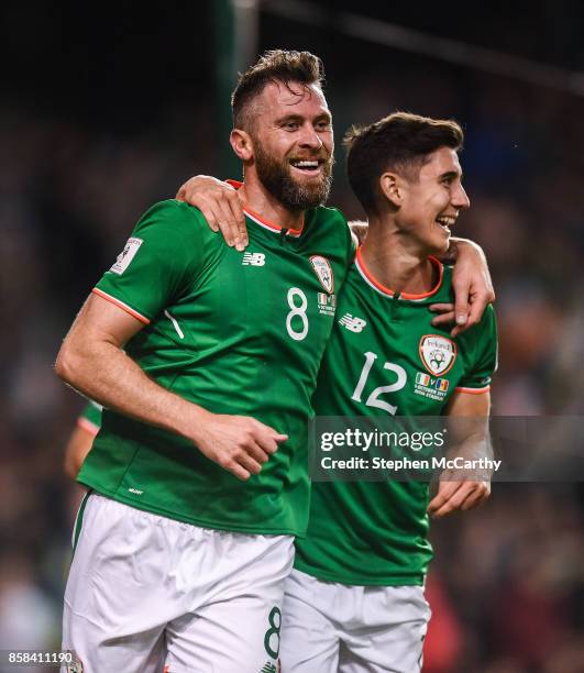 Dublin , Ireland - 6 October 2017; Daryl Murphy of Republic of Ireland celebrates after scoring his side's second goal with team-mate Callum O'Dowda,...