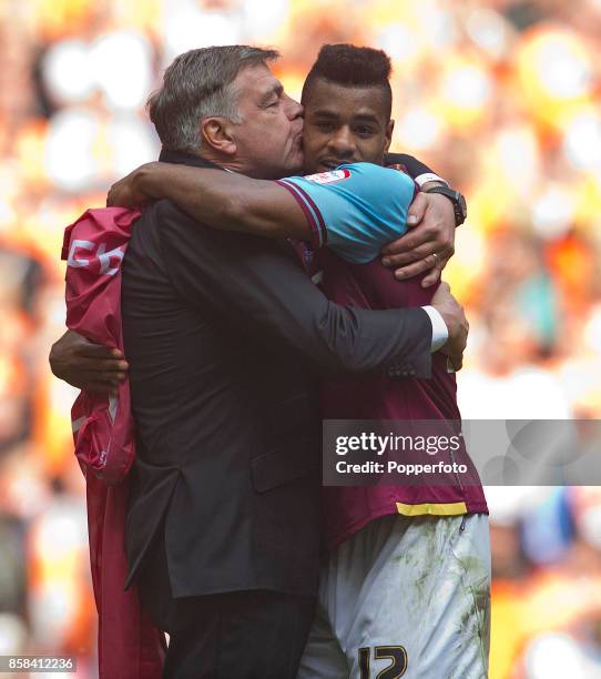 Ricardo Vaz Te of West Ham gets a kiss from manager Sam Allardyce after his team win the nPower Championship Playoff Final between West Ham United...