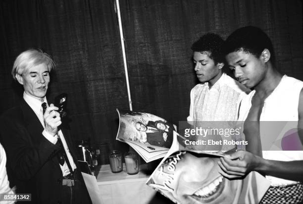 And Michael JACKSON and Randy JACKSON and Andy WARHOL, Artist Andy Warhol backstage with Michael and Randy Jackson - Jackson 5 Triumph Tour, reading...