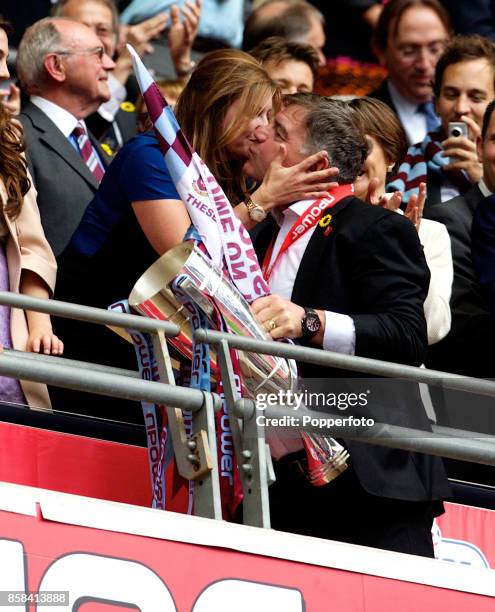 West Ham manager Sam Allardyce gets a kiss from Vice-Chairman of the club Karren Brady at the end of the nPower Championship Playoff Final between...