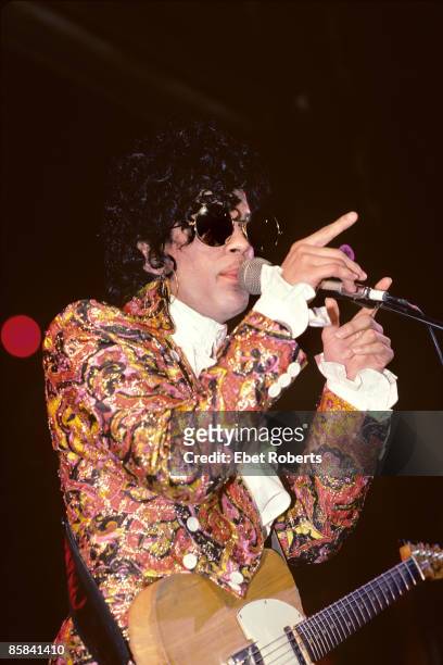 Prince performing on stage - Purple Rain tour