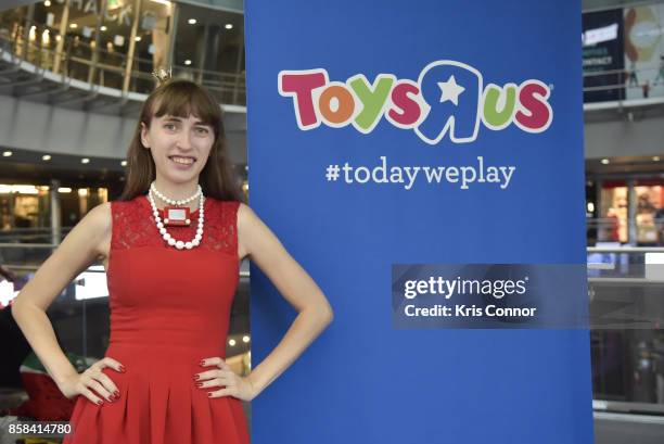 Jane Labowitch aka Princess Etch A Sketch plays with a giant Etch A Sketch during the "Toys "R" Us Takes Over Fulton Street Subway Station with Giant...