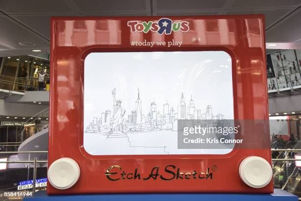 General View of a giant Etch A Sketch during the "Toys "R" Us Takes Over Fulton Street Subway Station with Giant Etch A Sketch," event at Fulton...