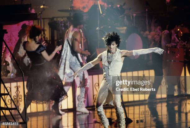 Prince performing on stage - Purple Rain tour