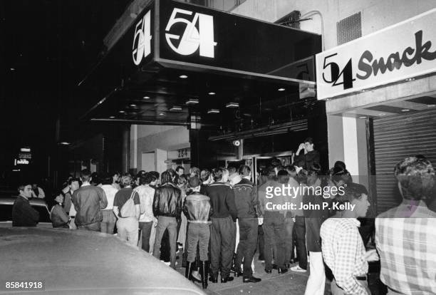 Photo of STUDIO 54, outside of club showing queue and name sign circa 1975.