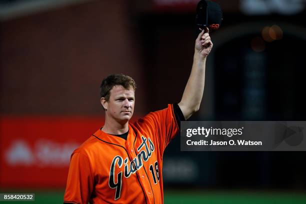 Matt Cain of the San Francisco Giants tips his hat on the field before the game against the San Diego Padres at AT&T Park on September 29, 2017 in...