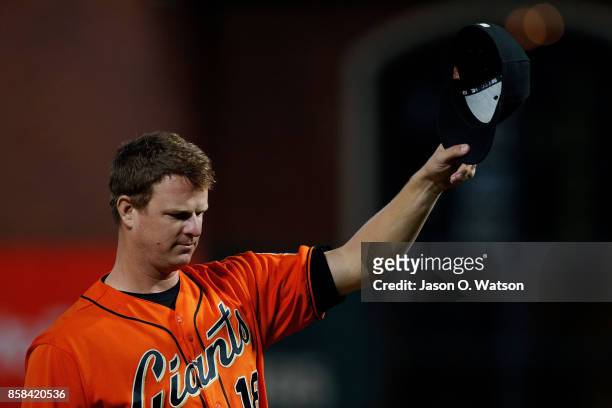 Matt Cain of the San Francisco Giants tips his hat on the field before the game against the San Diego Padres at AT&T Park on September 29, 2017 in...