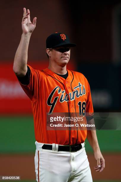 Matt Cain of the San Francisco Giants waves to fans on the field before the game against the San Diego Padres at AT&T Park on September 29, 2017 in...