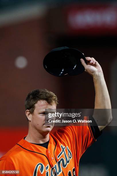 Matt Cain of the San Francisco Giants tips his hat on the field before the game against the San Diego Padres at AT&T Park on September 29, 2017 in...