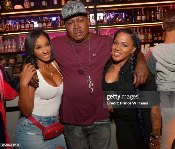 Bernice Burgos, Trick Daddy and Lil Mo attend Baller Alert's Bowl With a Baller at Basement Bowl on October 5, 2017 in Miami, Florida.