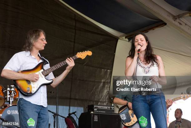 Photo of Shannon McNALLY and Sonny LANDRETH, and Shannon McNally performing live onstage