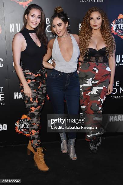 Lauryn, Chloe and Amelia Goodman attend the 'Shocktober' press night at Tulleys Farm on October 6, 2017 in Crawley, West Sussex.