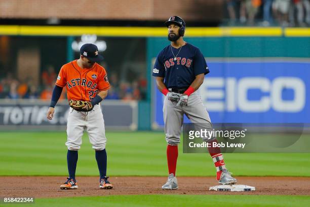 Chris Young of the Boston Red Sox looks on after hitting a double in the second inning against the Houston Astros during game two of the American...