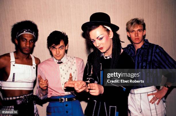 Photo of CULTURE CLUB and Mikey CRAIG and Jon MOSS and BOY GEORGE and Roy HAY; Posed group portrait L-R Mikey Craig, Jon Moss, Boy George and Roy Hay