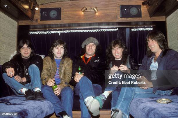 Photo of Simon WRIGHT and Malcolm YOUNG and Cliff WILLIAMS and Angus YOUNG and AC/DC and Brian JOHNSON and AC DC; L-R: Malcolm Young, Simon Wright,...