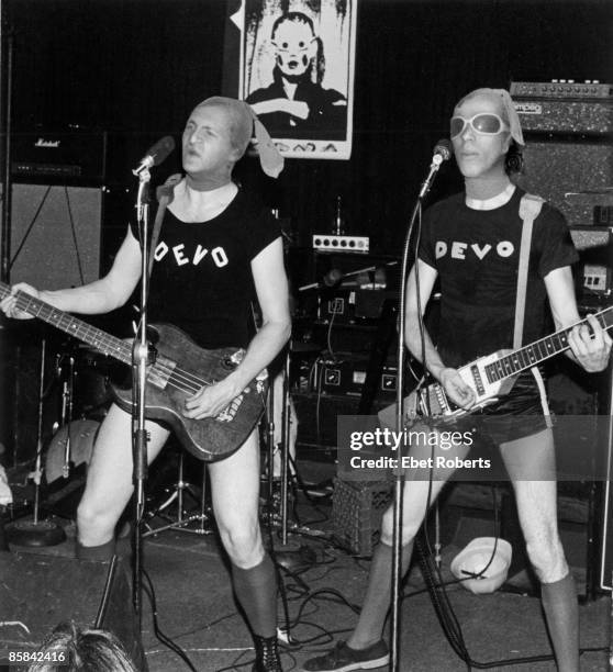 And Gerald CASALE and Mark MOTHERSBAUGH, Gerald Casale and Mark Mothersbaugh performing on stage