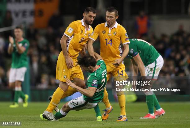 Republic of Ireland's Harry Arter goes to ground after being confronted by Moldova's Alexandru Gatcan during the 2018 FIFA World Cup Qualifying,...