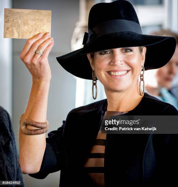 Queen Maxima of The Netherlands, with a 3d picture of her daughters, visits 5th Teacher's Congress the on October 5, 2017 in Amersfoort, Netherlands....
