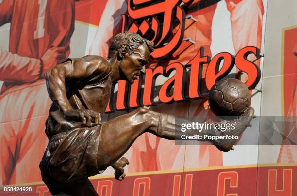 The Dennis Bergkamp statue is unveiled outside the stadium before the match between Arsenal and Sunderland in the Barclays Premier League at the...
