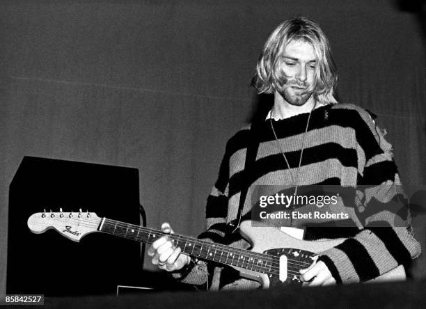 Kurt Cobain performing live onstage at Roseland Ballroom, New Music Seminar, wearing stripy jumper, 23rs July 1993.