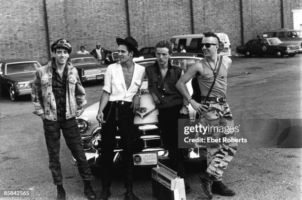 Paul SIMONON and CLASH and Mick JONES and Joe STRUMMER and Terry CHIMES, L to R: Mick Jones, Paul Simonon, Terry Chimes, Joe Strummer - posed, group...