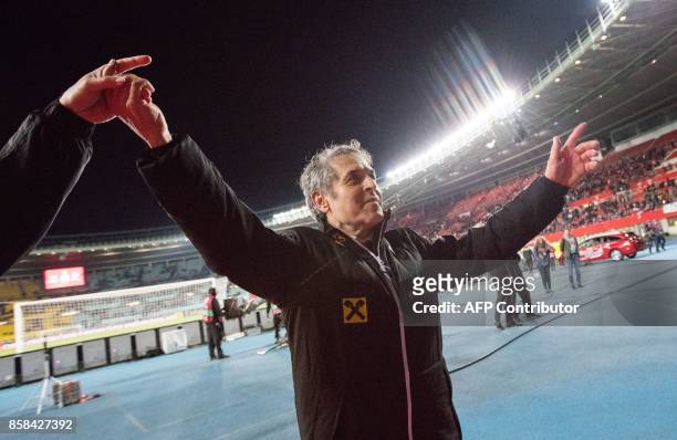 Austria's head coach Marcel Koller celebrates at the end of the FIFA World Cup 2018 qualification football match between Austria and Serbia at the...