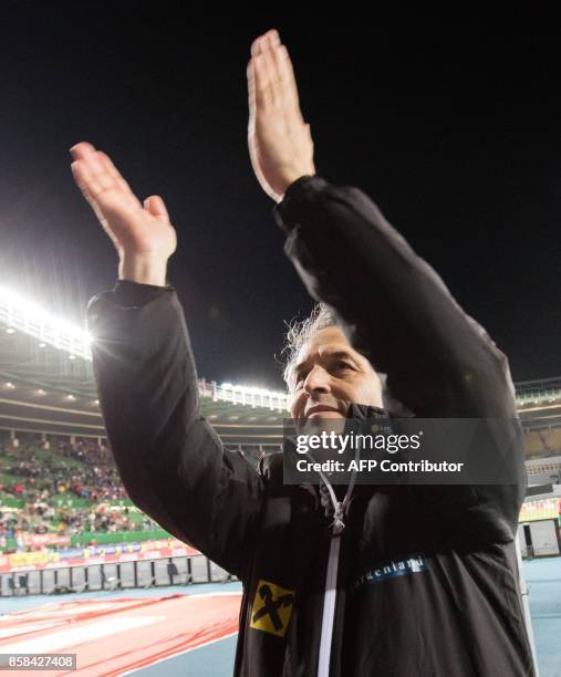 Austria's head coach Marcel Koller celebrates at the end of the FIFA World Cup 2018 qualification football match between Austria and Serbia at the...